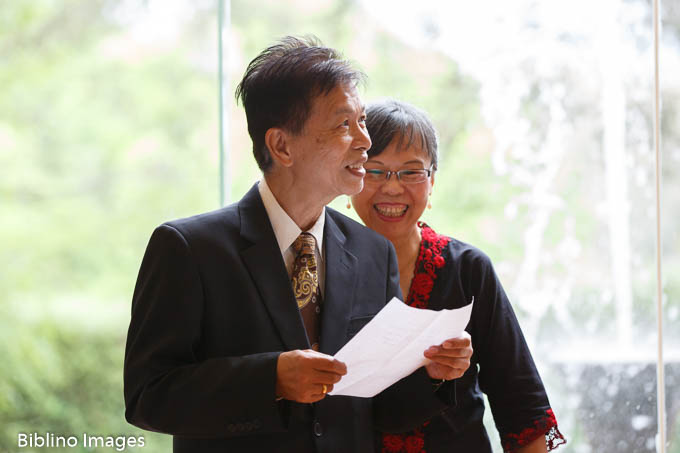 Parents reading at ceremony